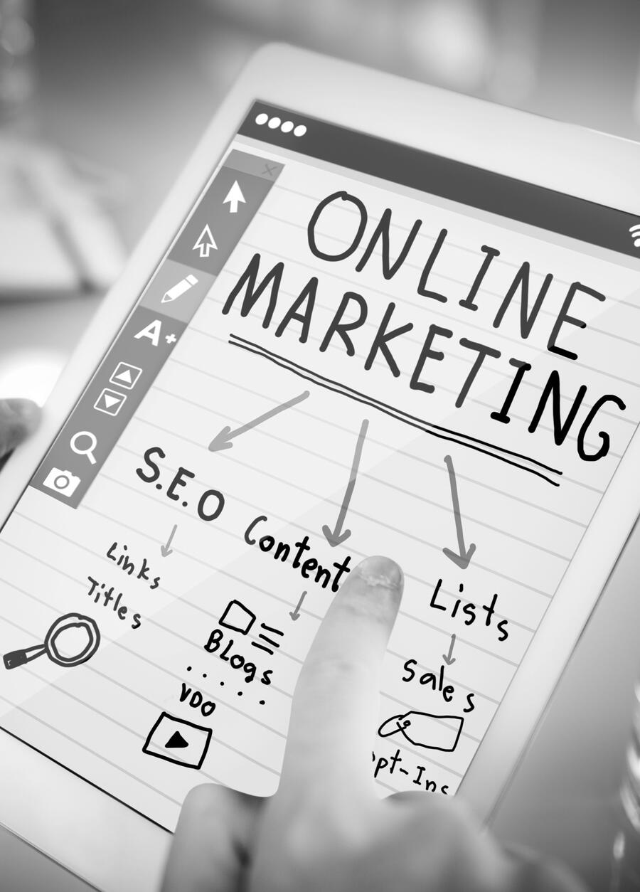 Picture of a blackboard with "marketing" written on it